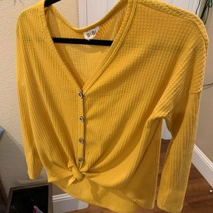 yellow cardigan style shirt